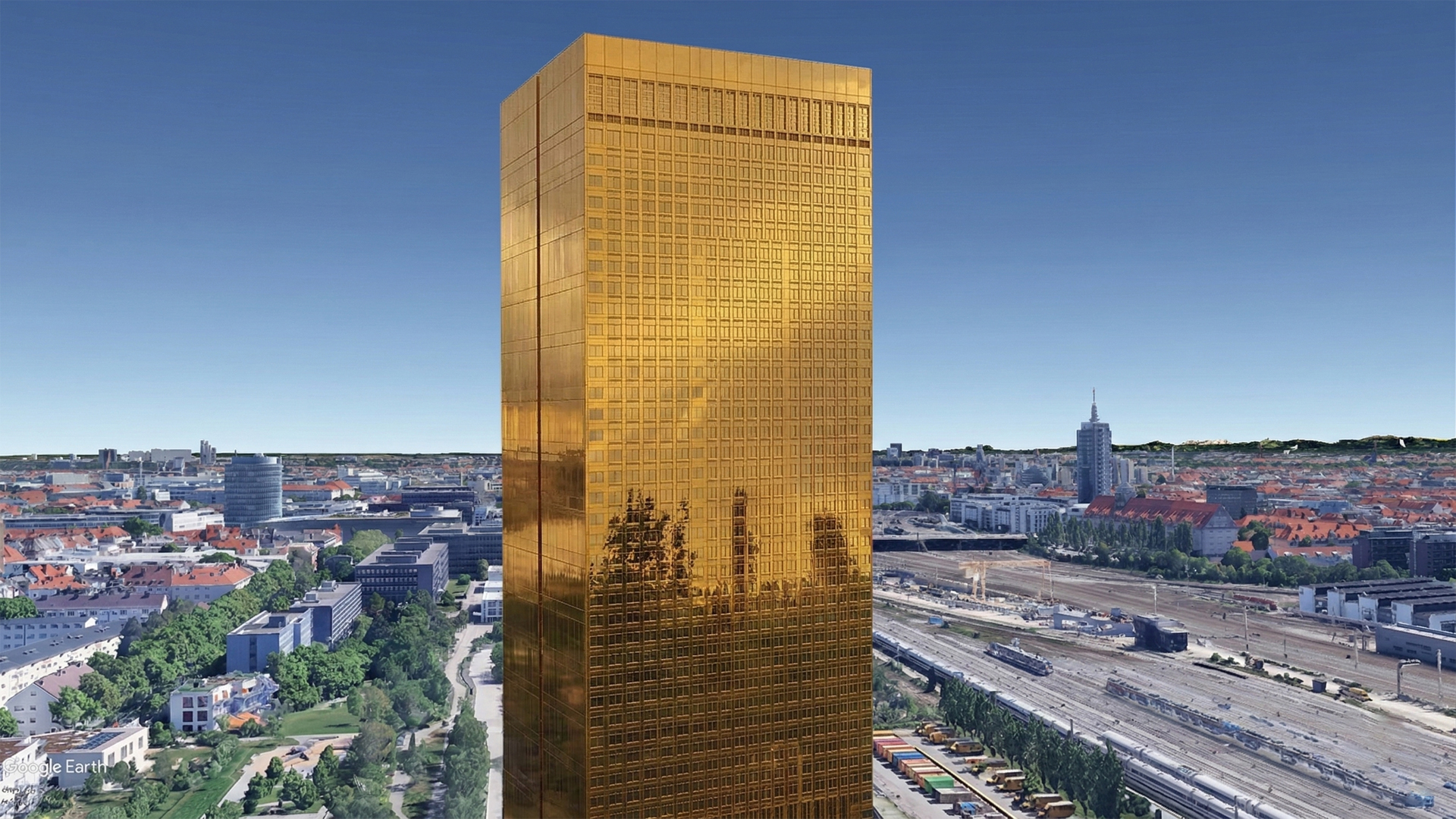 Golden Tower Munich above the clouds with Alps panorama